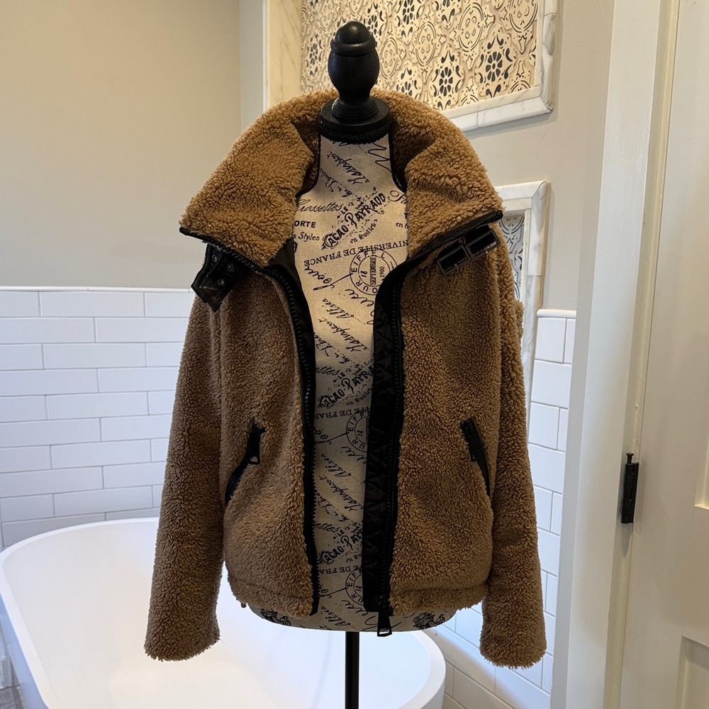 SAM. Tan Sherpa Denver